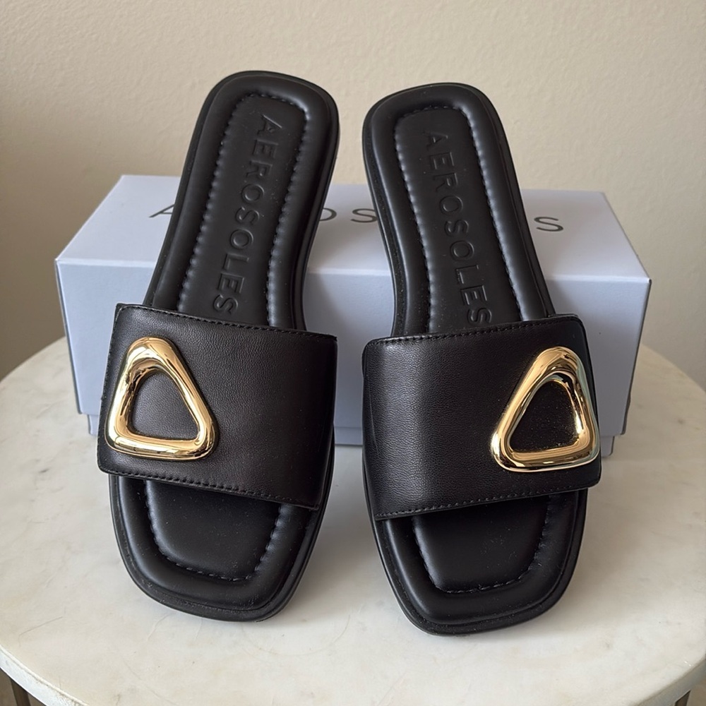 Aerosoles Blaire slide sandal with in black leather with gold detail. Never worn